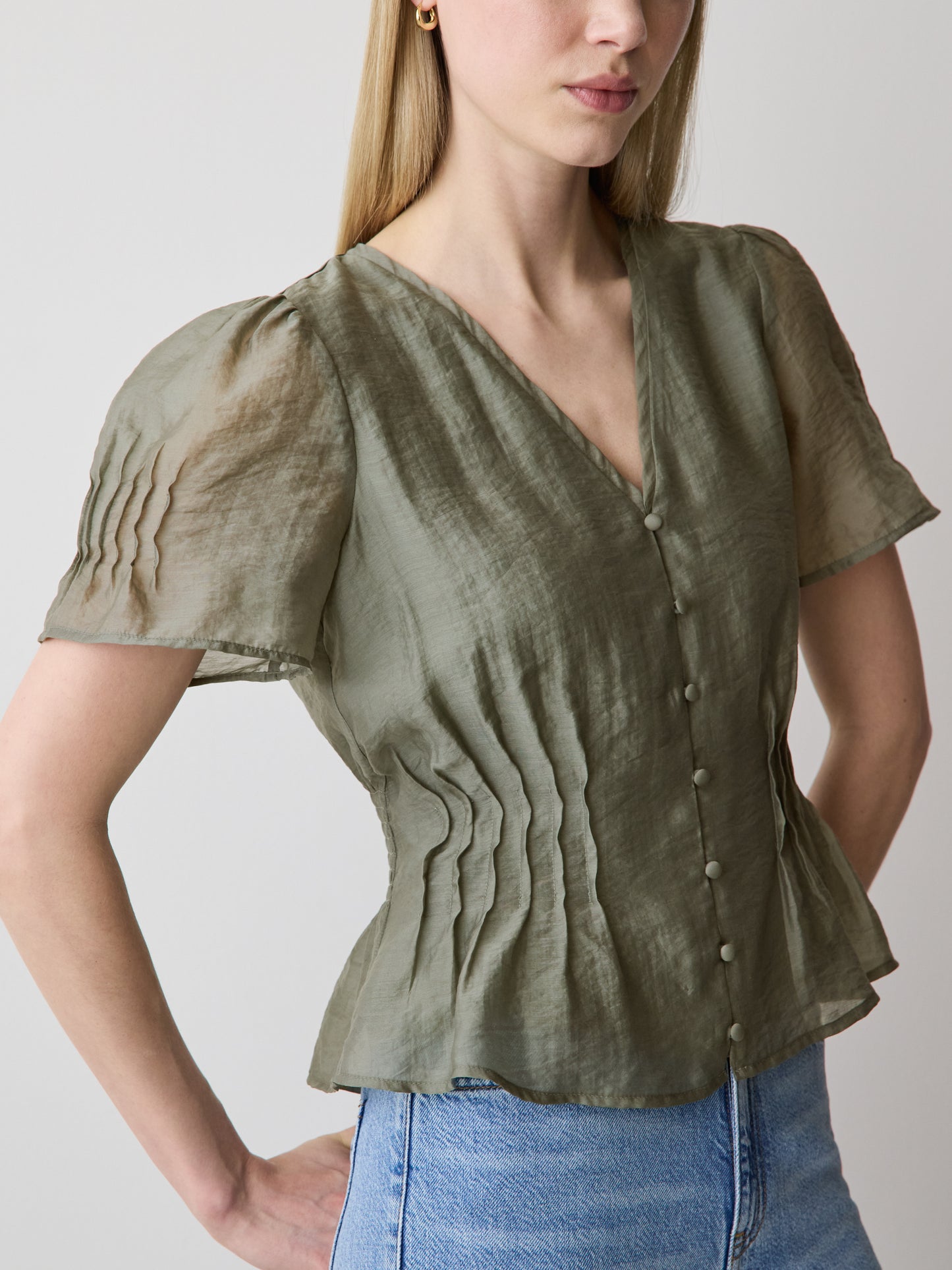 Sleeveless V-Neck Peplum Blouse