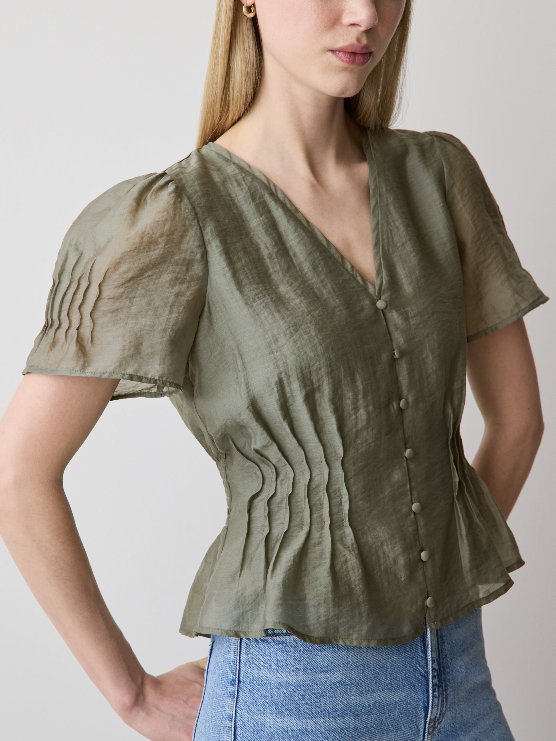 Sleeveless V-Neck Peplum Blouse