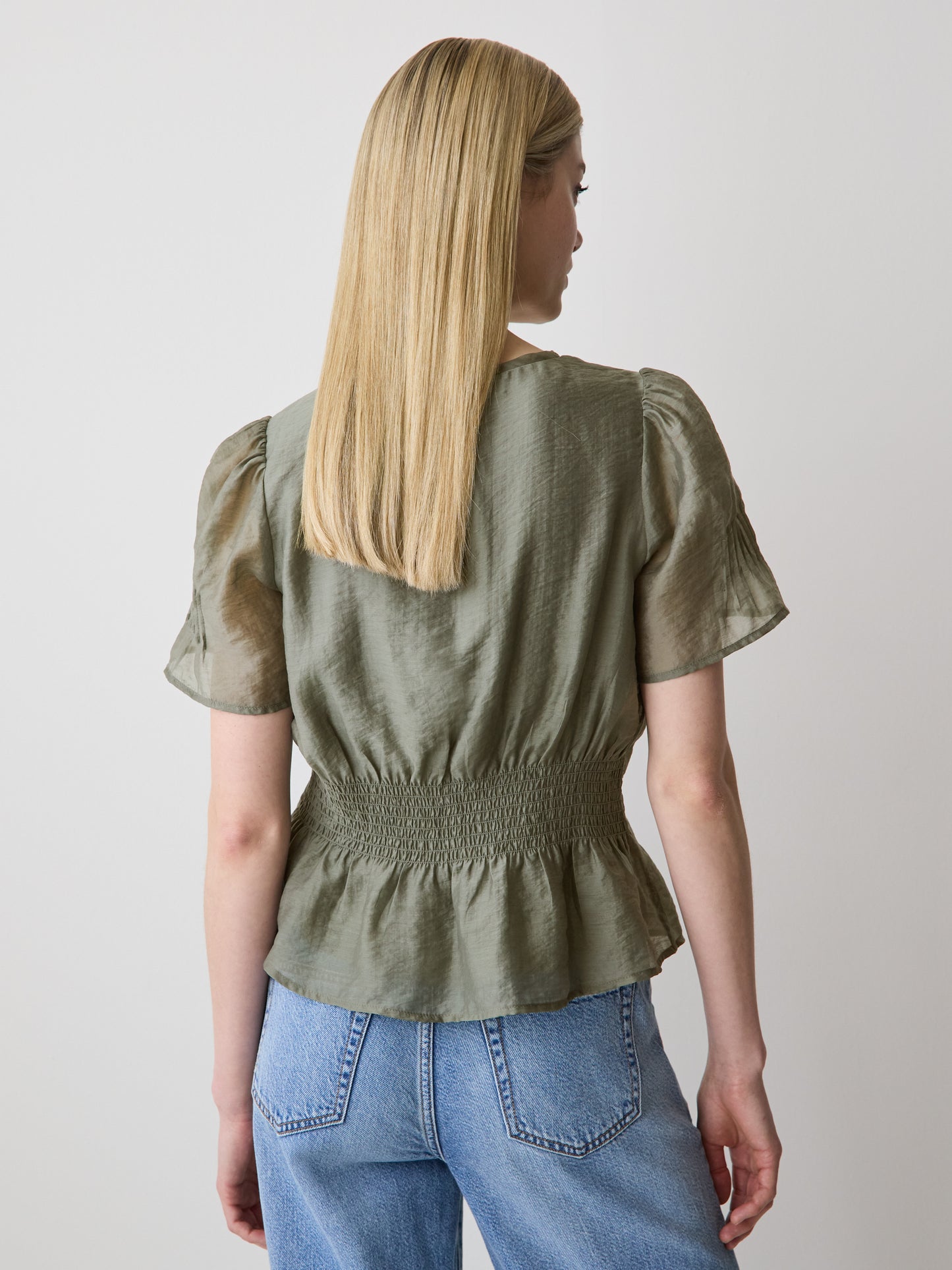 Sleeveless V-Neck Peplum Blouse
