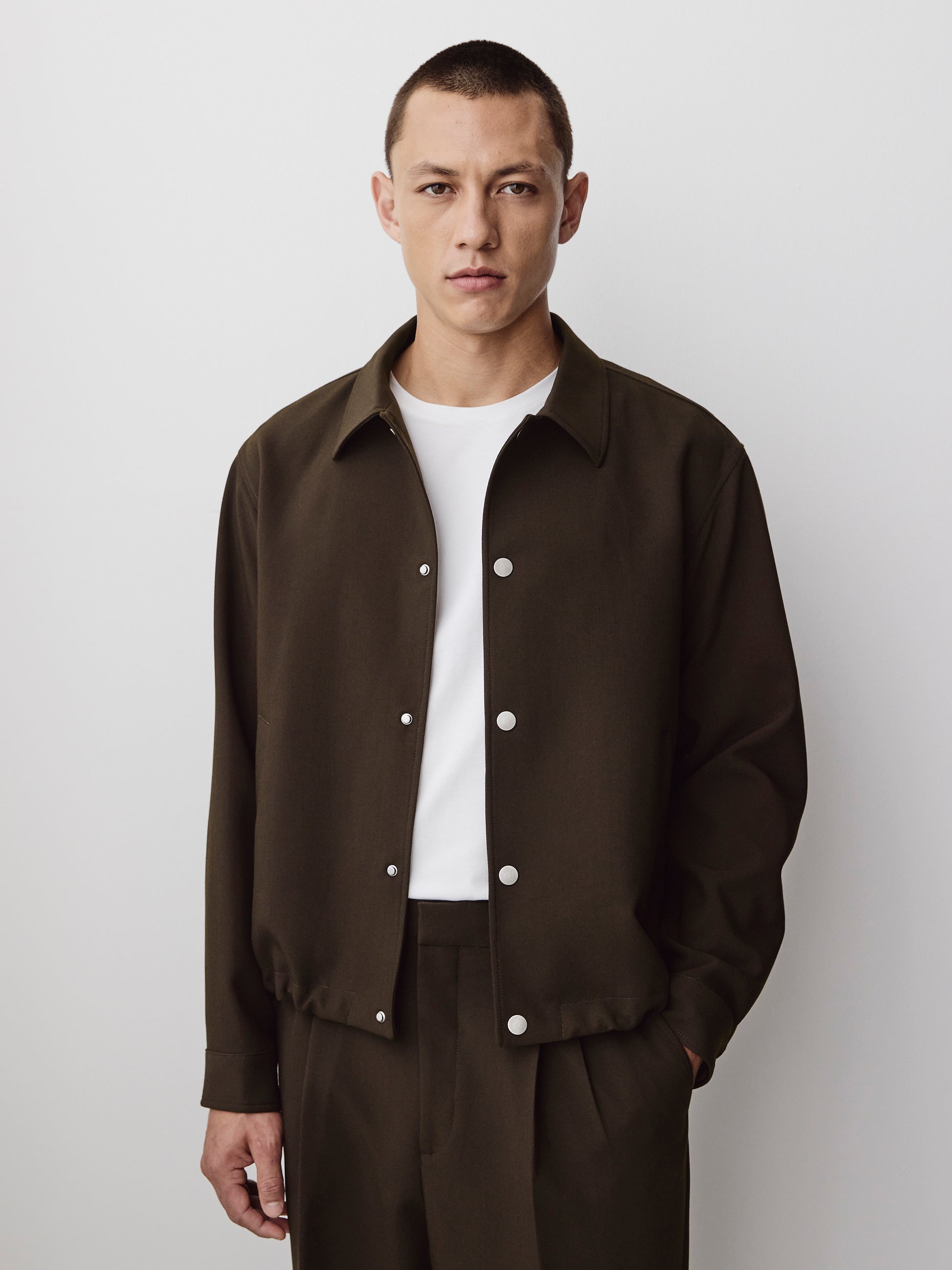 Men's Woven Jacket with Snap Closure
