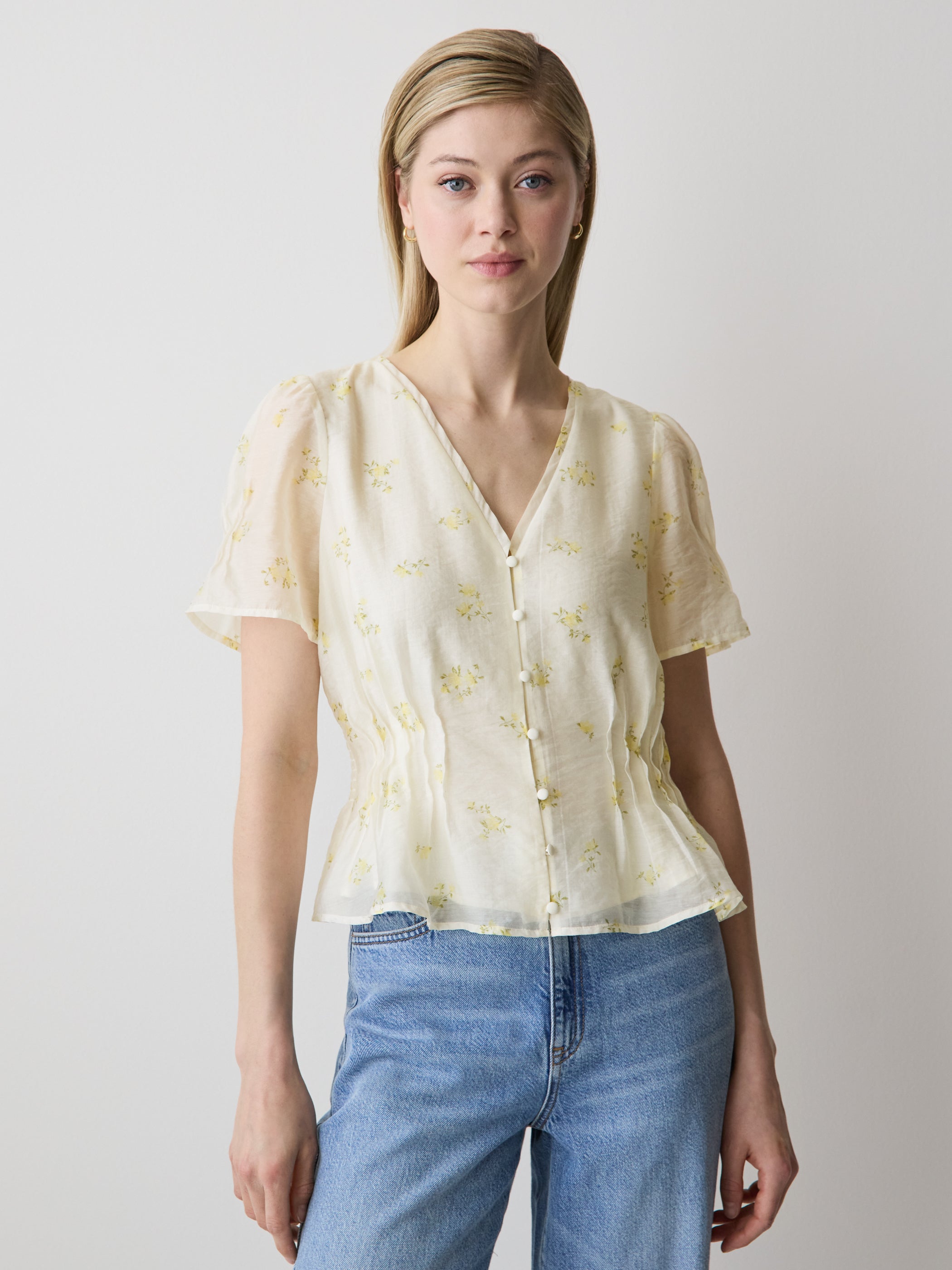 Sleeveless V-Neck Peplum Blouse
