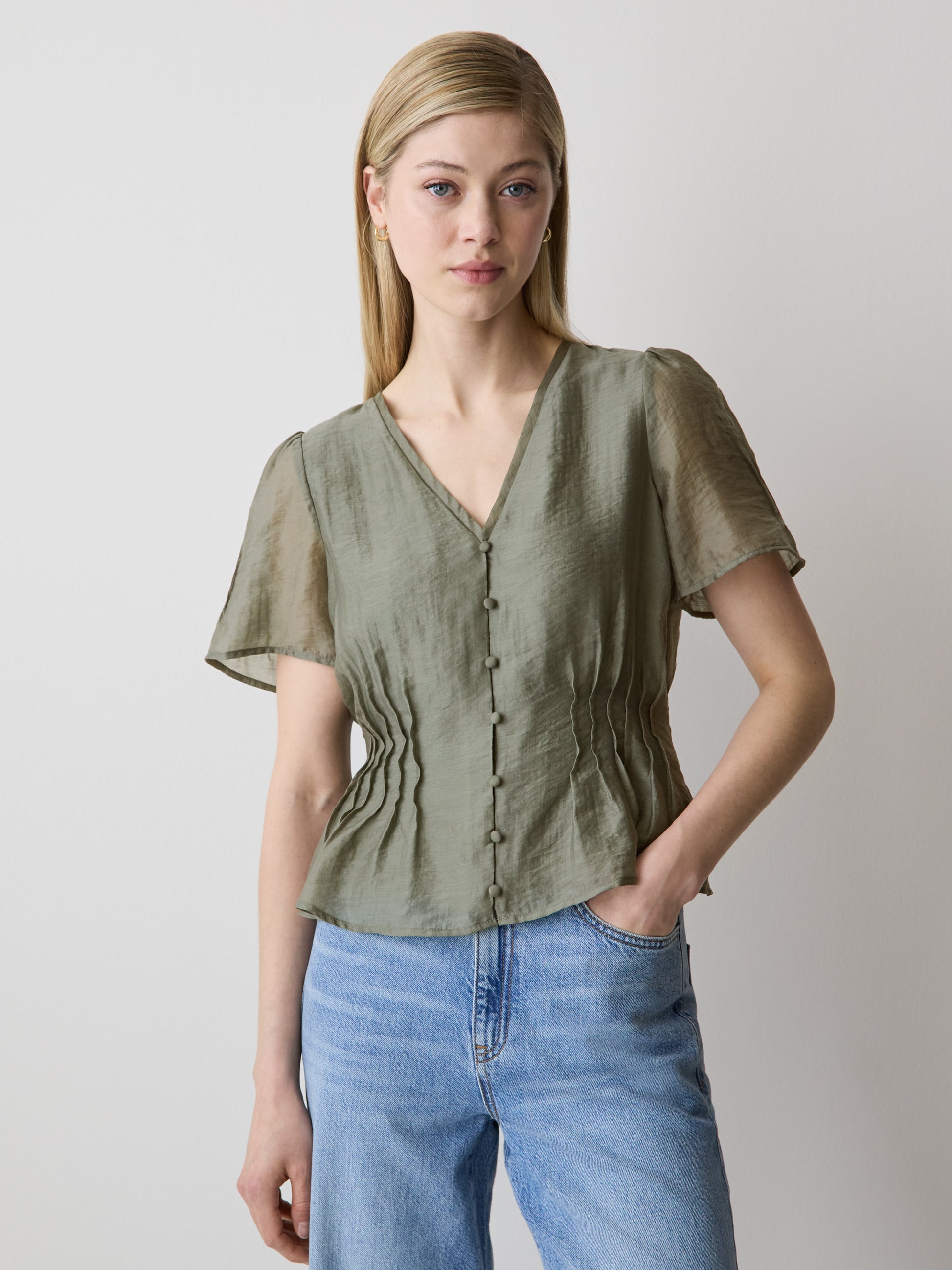 Sleeveless V-Neck Peplum Blouse