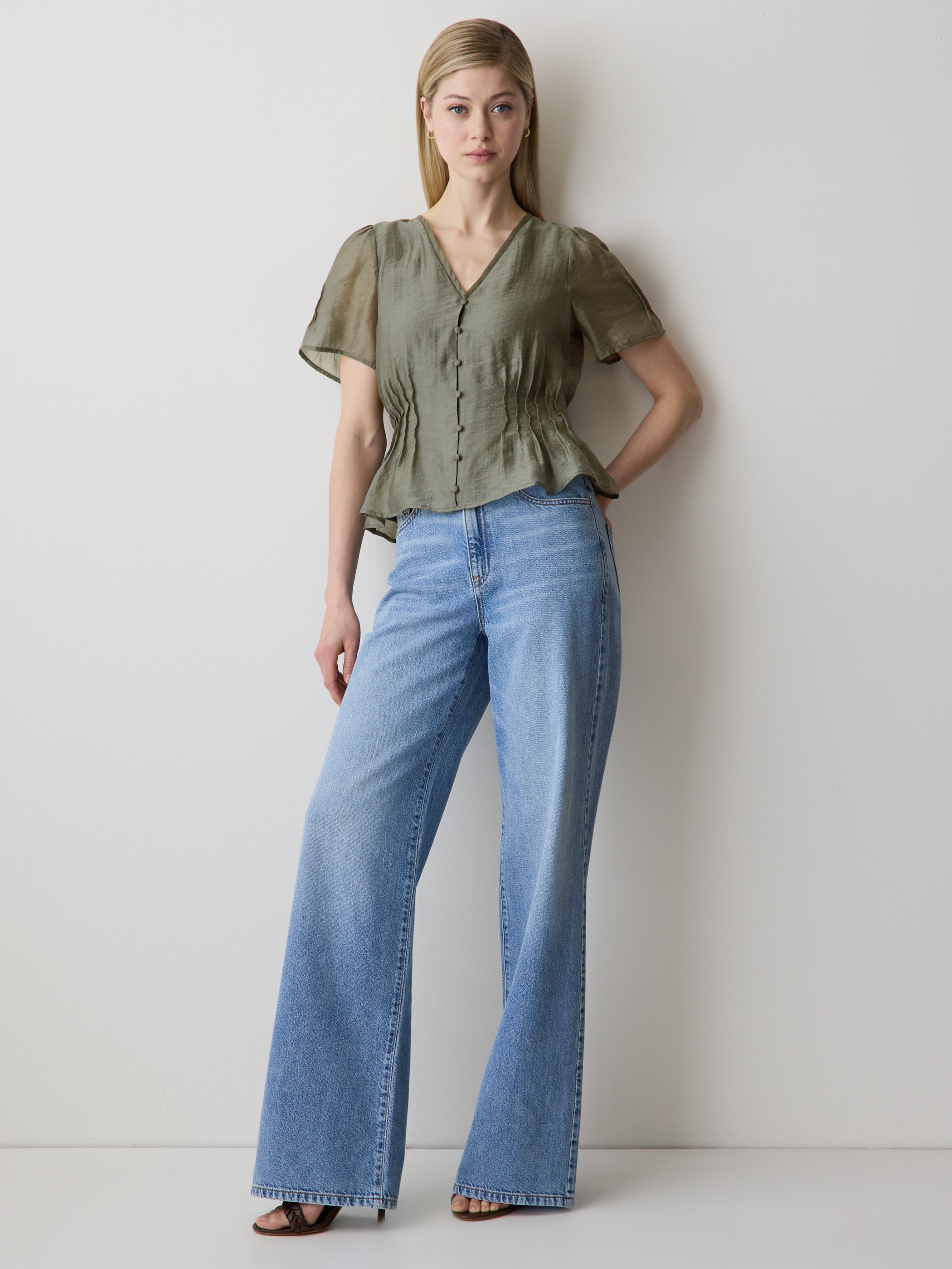 Sleeveless V-Neck Peplum Blouse