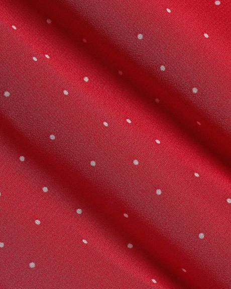 Blouse p&eacute;plum sans manches