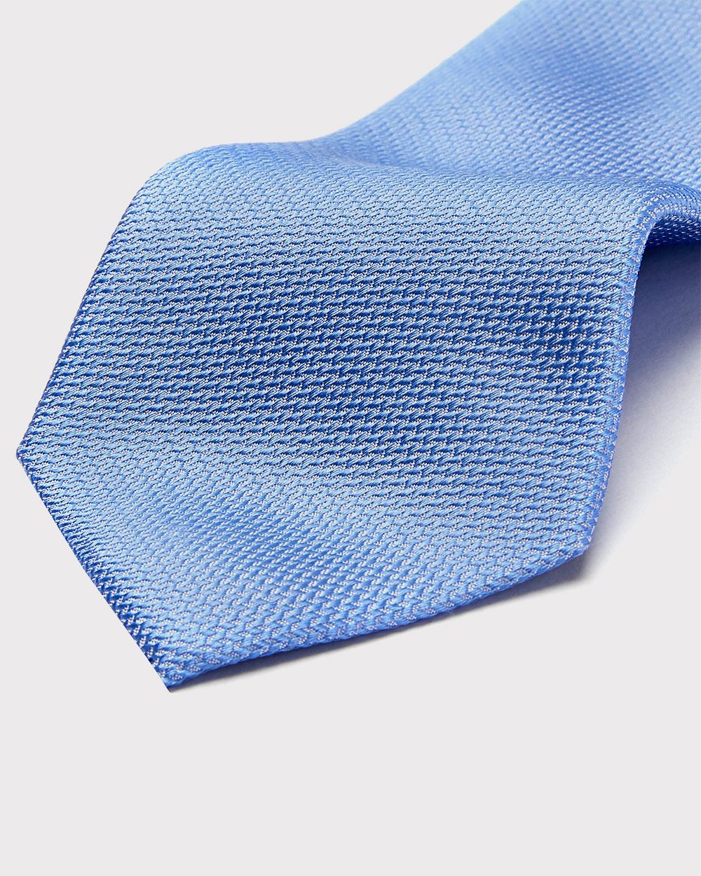 Regular light blue tie